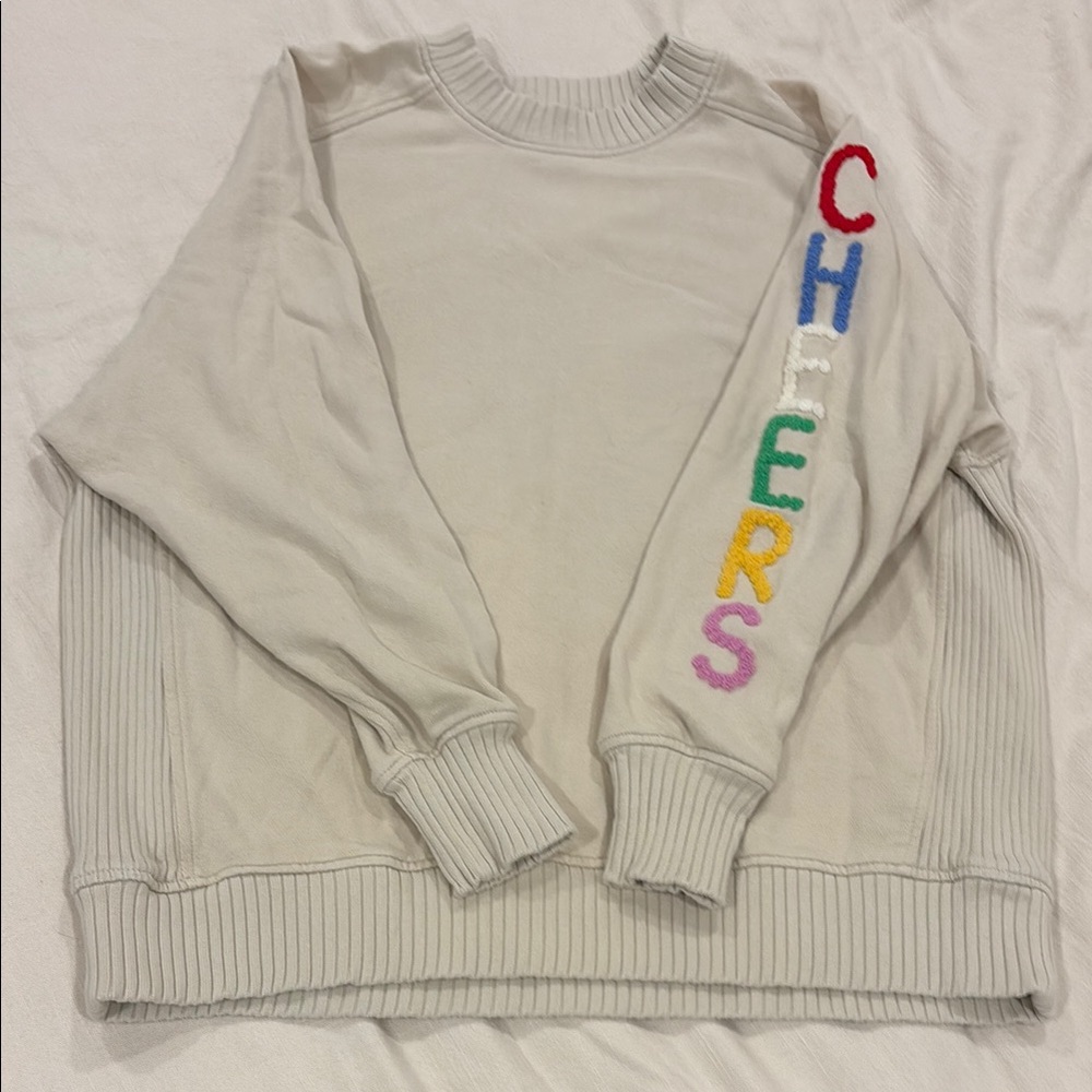aerie Cream Crewneck Sweater with Multicolor 'CHERS' Sleeve Embroidery